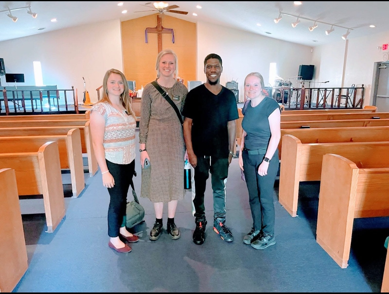 Fellowship with church family in the sanctuary